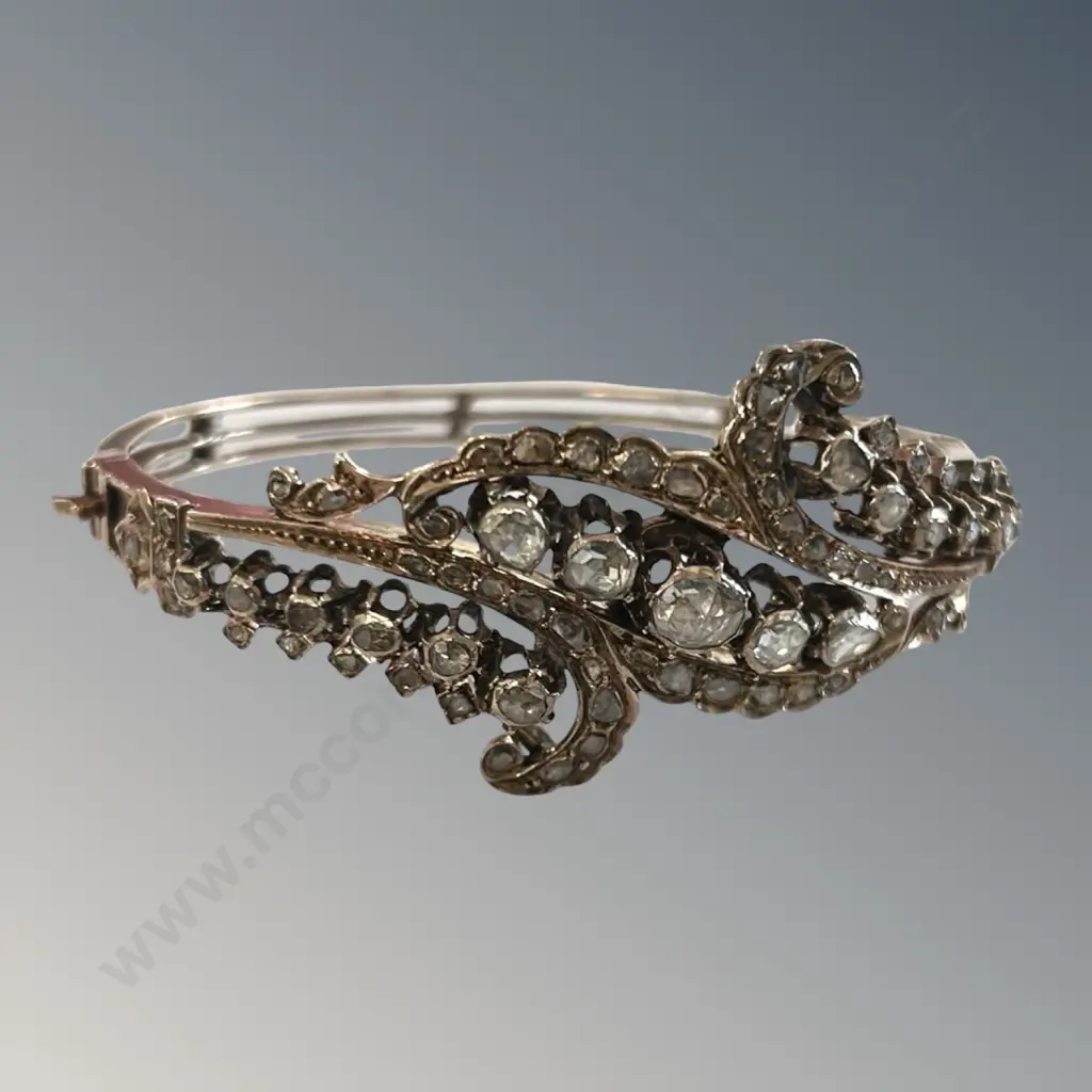 8ct Yellow Gold and Silver Cross-over Style Multi Diamond Set Bracelet, TGW1.46ct, TW22.54gms, Valuation $7900 Image 1++