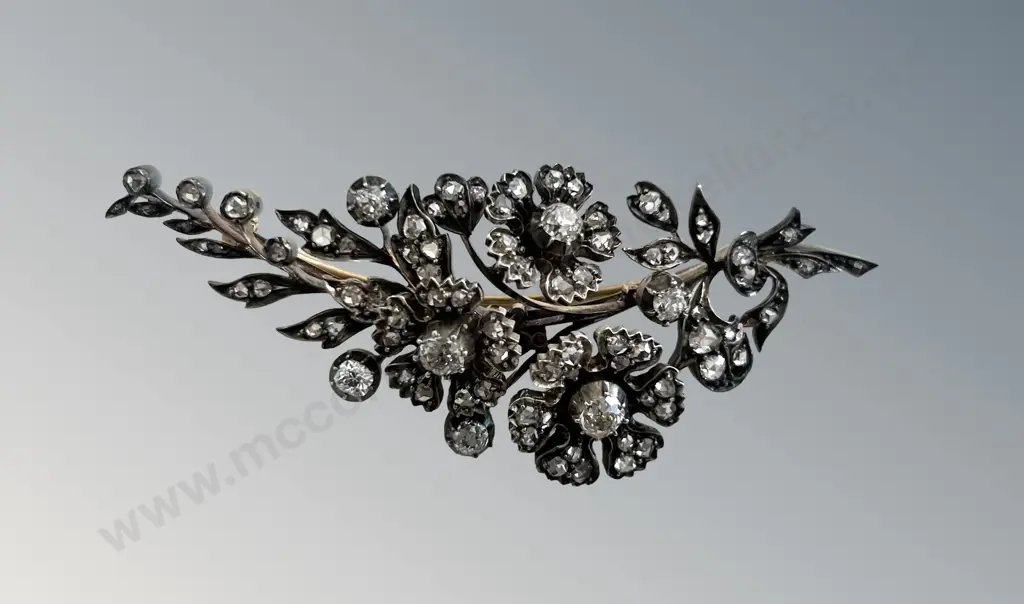 Mid 1800's 18ct and 9ct Gold, Sterling Silver Multi Diamond Set Flower and Leaf Design Brooch, TGW2.5ct, TW16.5gms Image 1++