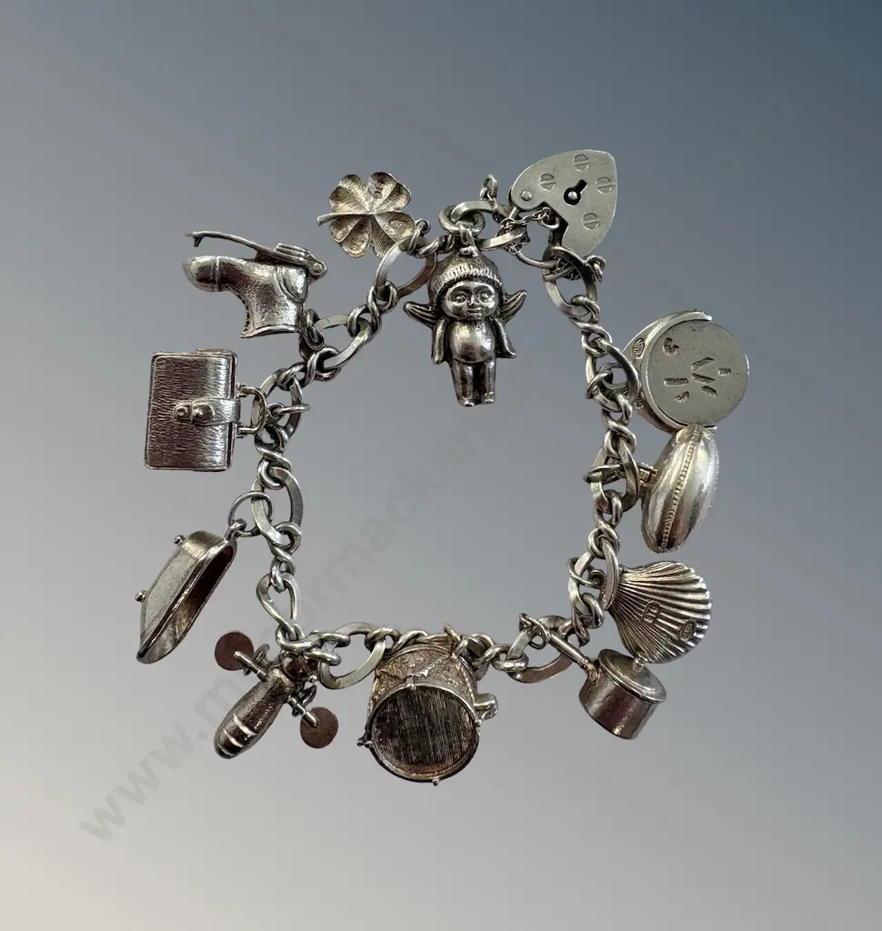 Sterling Silver Charm Bracelet, L20cm TW56gms Image 1++
