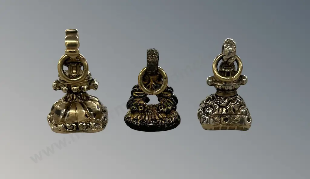 Three Gold Plated Seals Image 1++