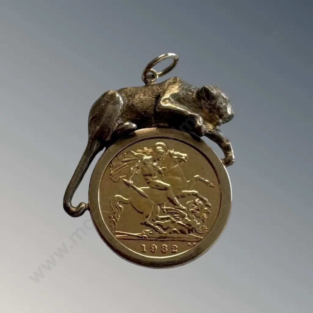 22ct Half Sovereign 1982 set in 9ct Gold Pendant with Lion Motif, Sovereign 3.99gms, 9ct Surround 3.31gmsTW7.3gms Image 1++