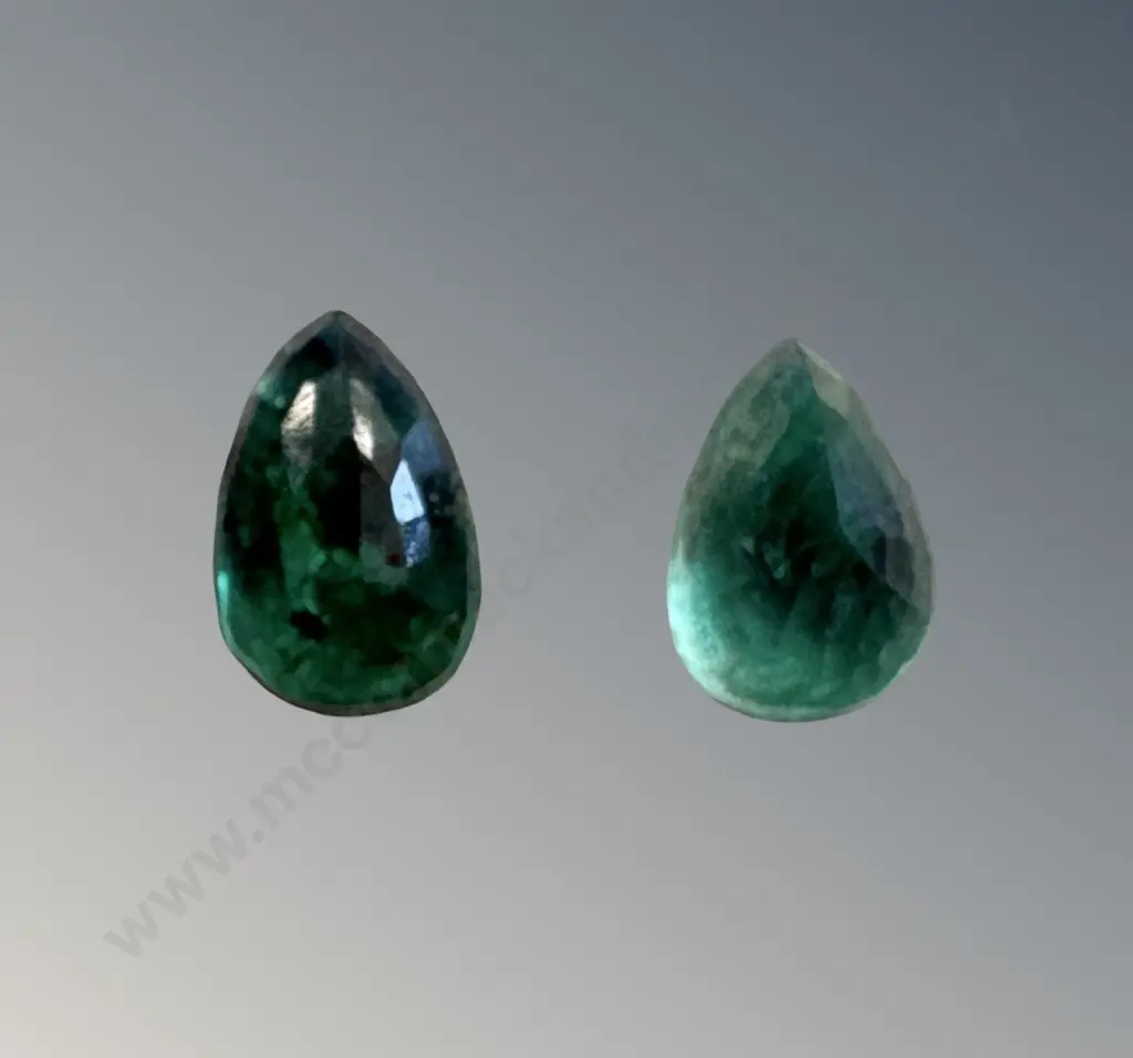 Two Pear Shaped Emeralds (loose stones) 0.4ct & 0.55ct Image 1++
