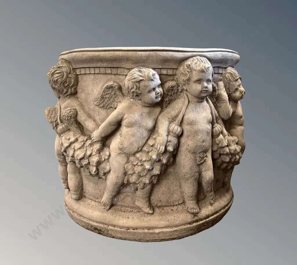 Round Stone Planter with Cherub Motifs H33xD36cm Image 1++