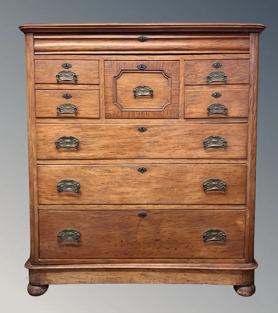 Burr Totara Eight Drawer Scotch Chest on Bun Feet with Brass Pulls H136xW114xD51cm Image 1++