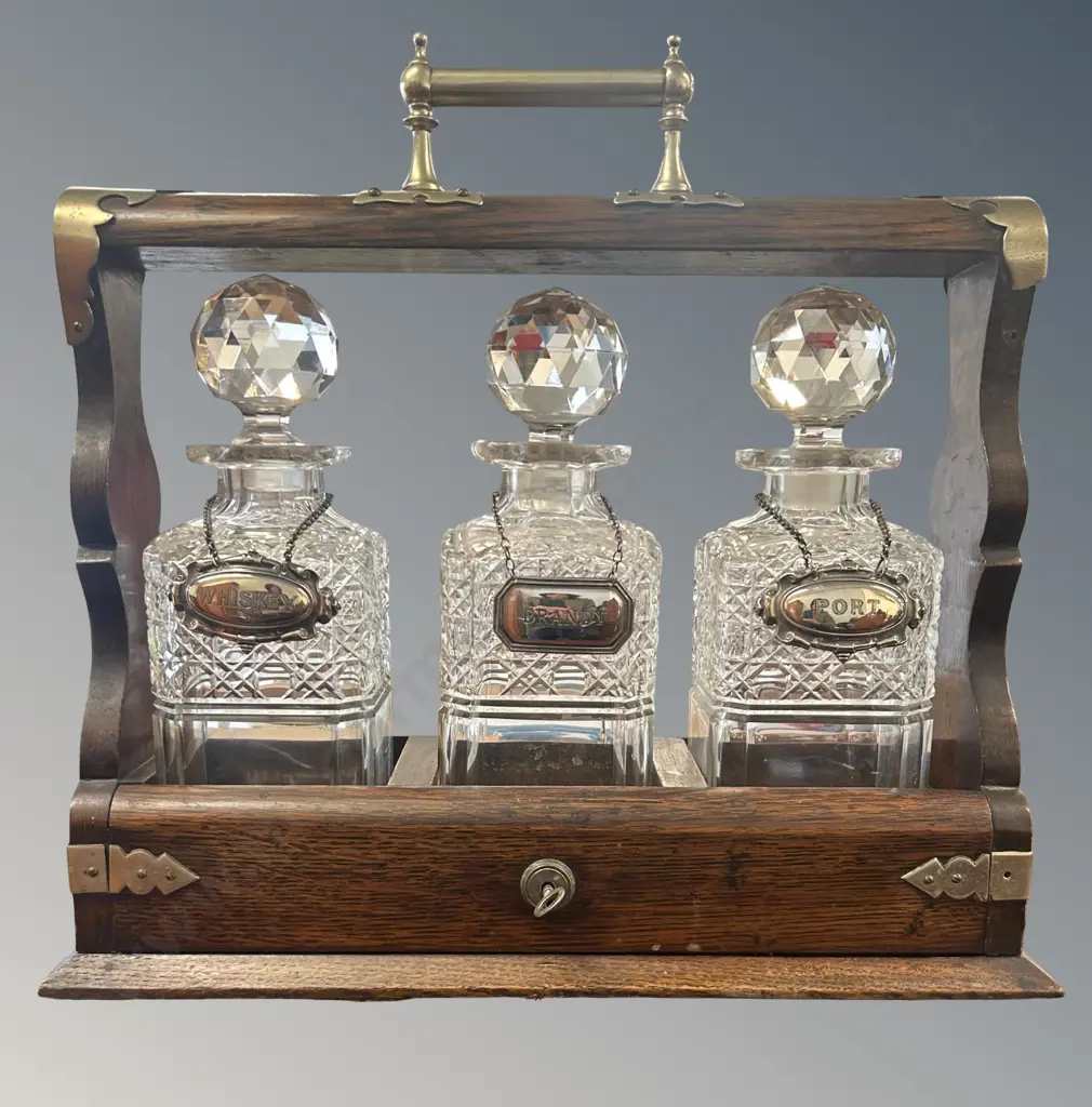 Three Bottle Oak and Metal Bound Tantalus with Sterling Silver and Silver Plate Decanter Labels Image 1++