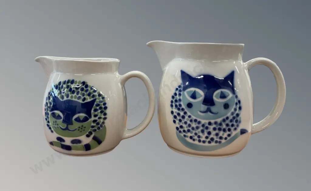 Two Graduated Arabia of Finland Ceramic Pitchers featuring the 'Blue Cat' design by Gunvor Olin-Gronqvist, H16 &13cm Image 1++