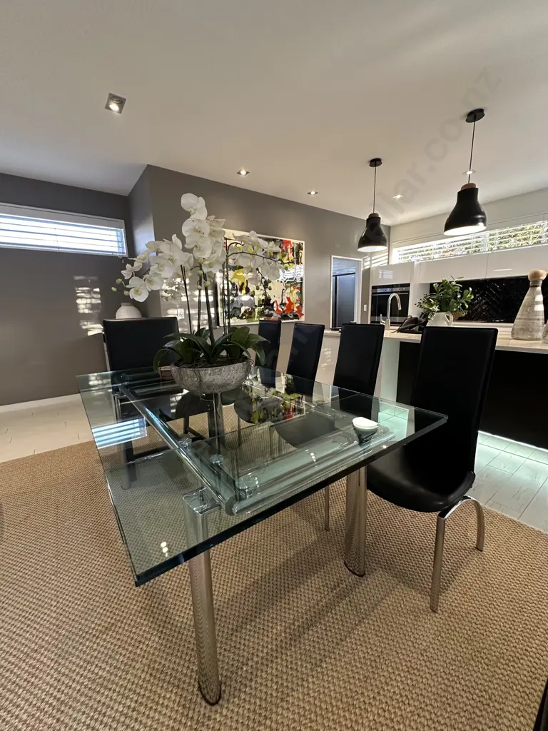 Contemporary Glass Dining Table with Two Leaves on a Chrome Base L182-262cm W106cm Image 1++