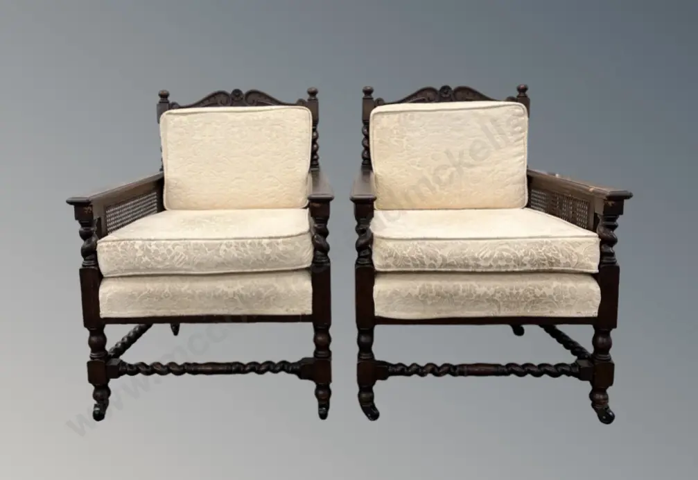 Pair of Oak Jacobean Style Arm Chairs with Barley Twist Legs, Cane Side Panel & Upholstered Cushions Image 1++