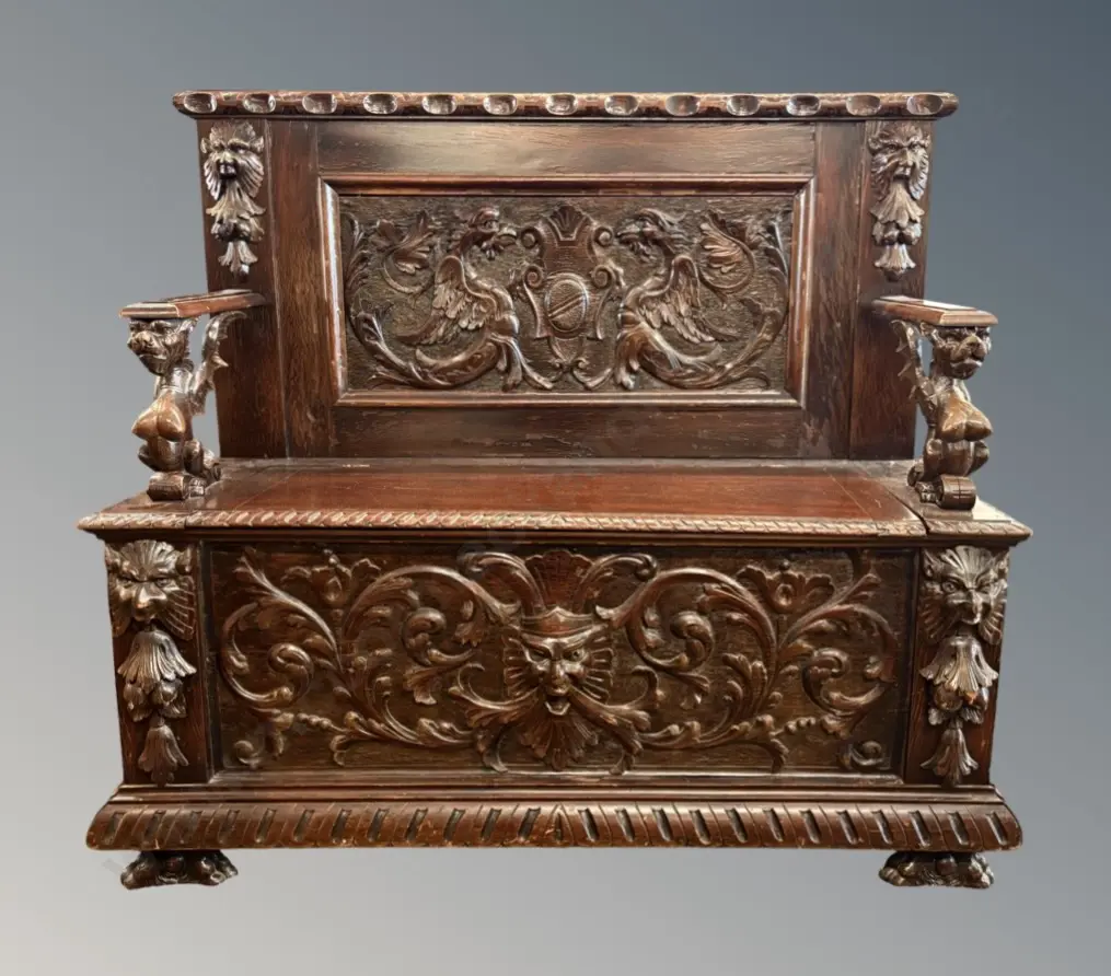 Dark Wooden Settle with Ornate Carving depicting Dragons, Scrolling Floral Patterns and Figural Griffin Armrests, AF arm Image 1++