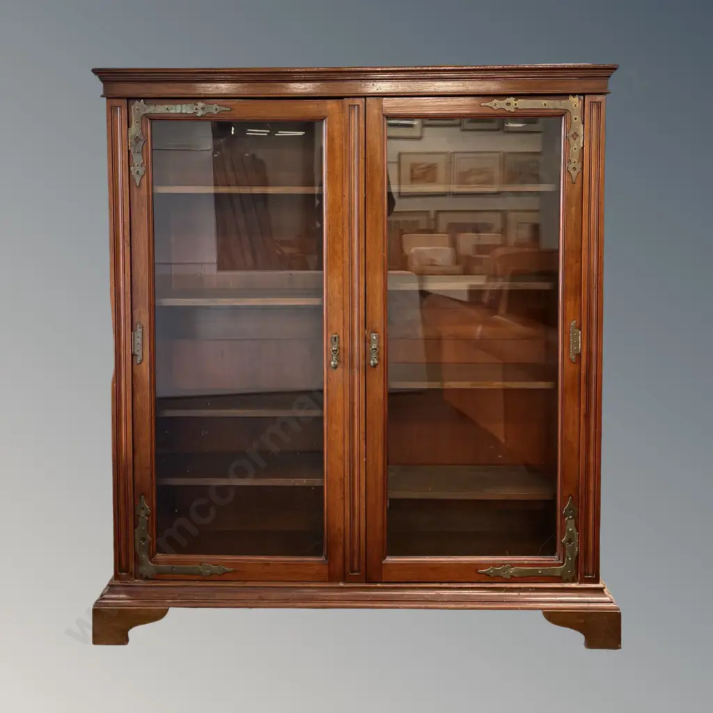 Mahogany Glazed Door Bookshelf with Decorative Brass Features, small cracks to bottom corners of glass H154xL132xD31cm Image 1++
