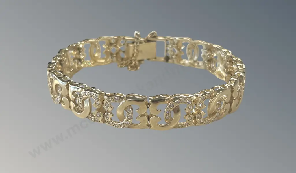 14ct Gold and Diamond encrusted Bracelet, L17cm, TW22.01gms Image 1++