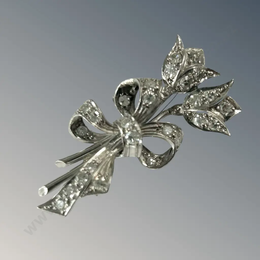 14ct White Gold Diamond Bow Brooch, TW3.76gms, Valuation $5200 Image 1++