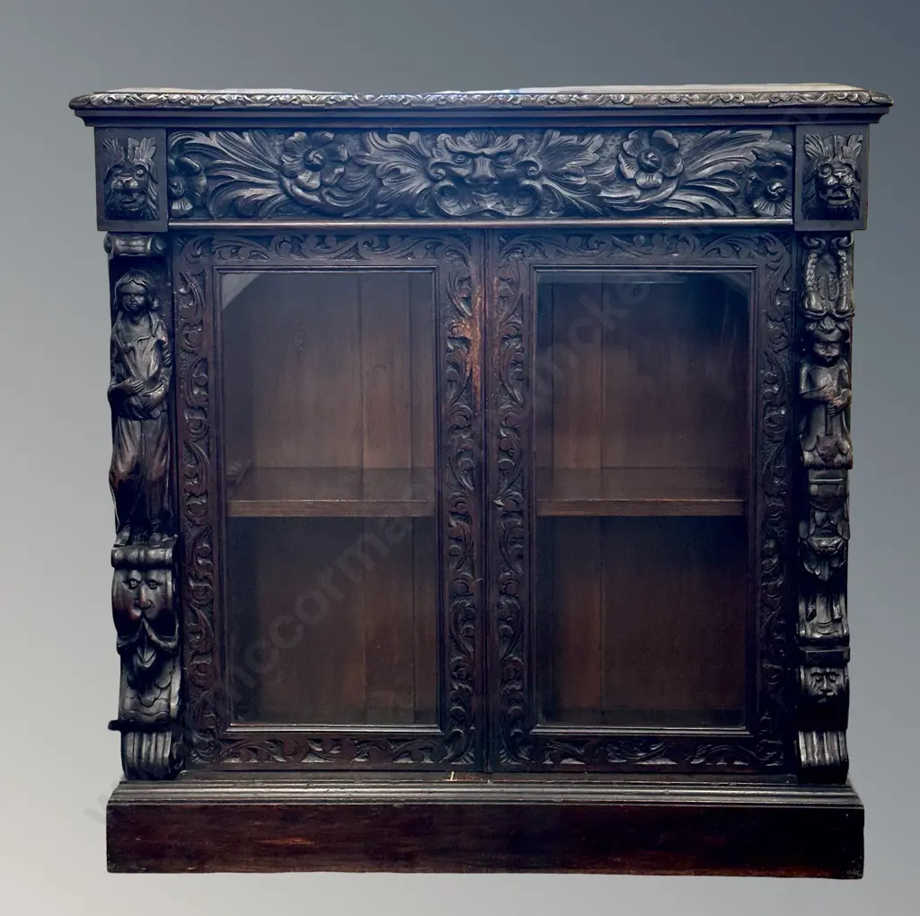 Dark Oak Ornately Carved Display Cabinet with 2 Glazed Doors, Featuring Floral and Figural Motifs Image 1++