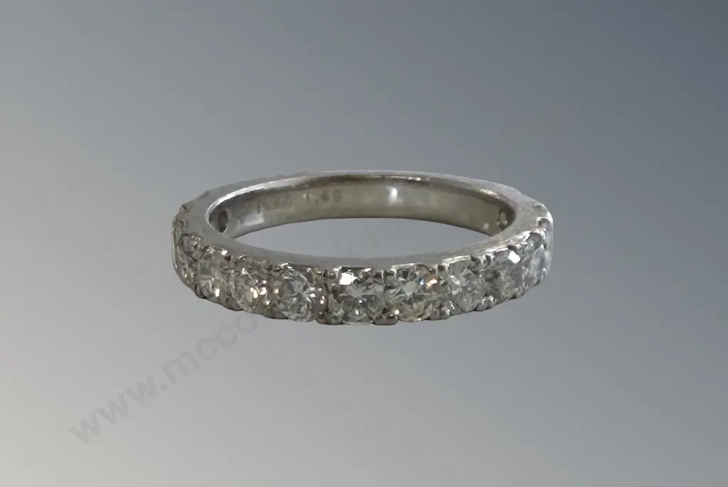 Platinum and Diamond Channel Set Ring, TDW1.49ct, S M, TW5.31gms Image 1++