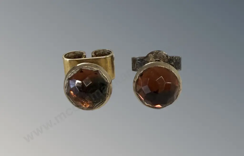 Pair of Gold and Topaz Studs Image 1++