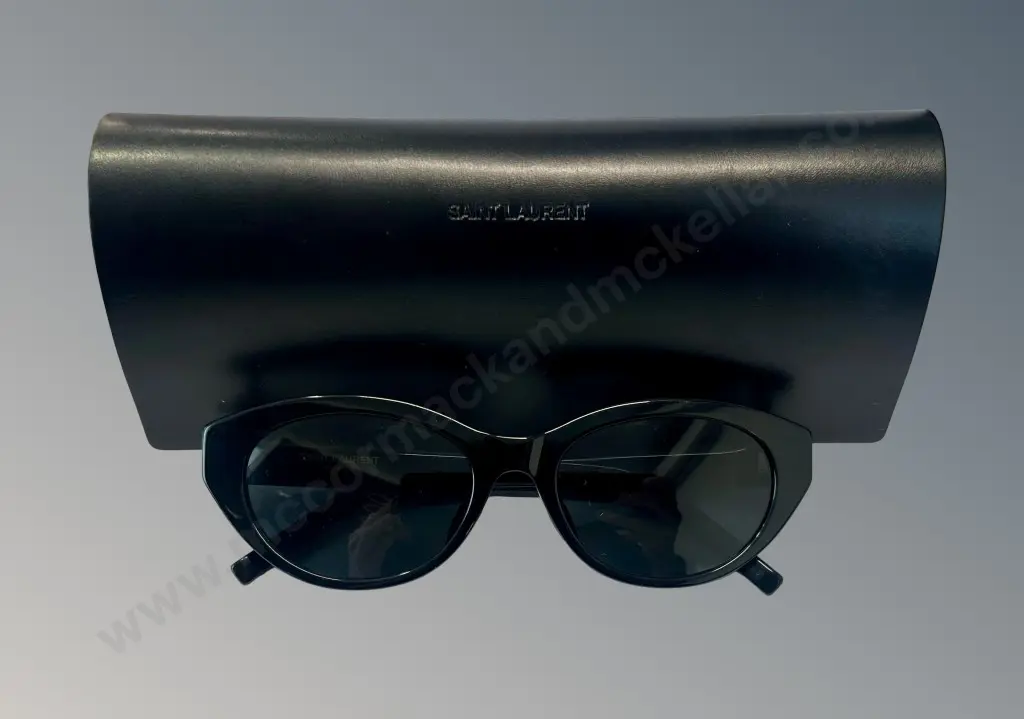 Saint Laurent Sunglasses - SL M 148 Oval Sunglasses featuring Glossy Black Frame and Dark Lens Image 1++