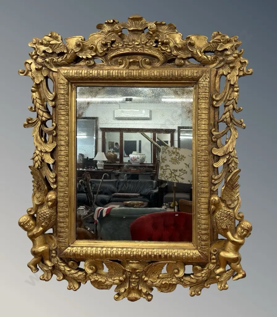 Heavily Carved Gilt Wall Mirror with Cherubs, Birds and Floral Scroll Patterns, H113xW92cm Image 1++