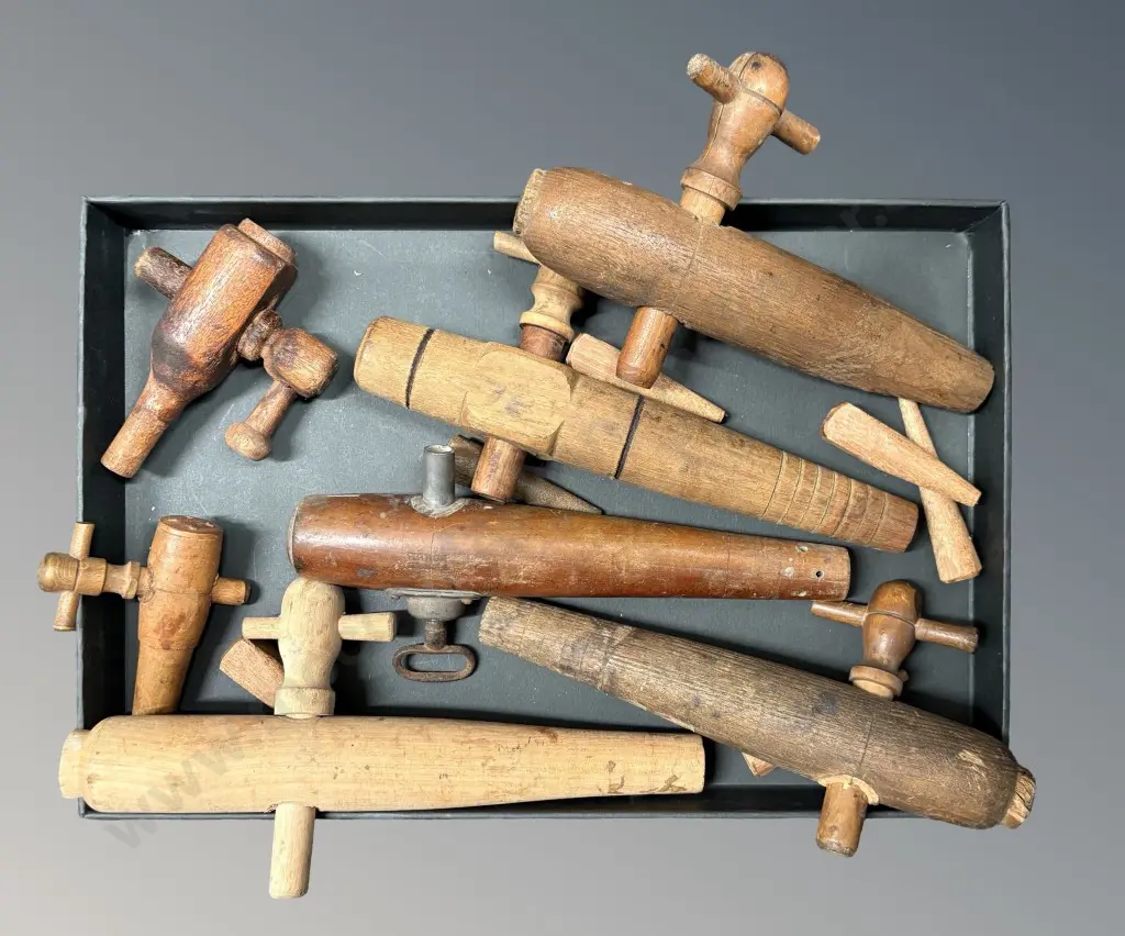 Box of Wooden Barrel Taps and Bungs Image 1++